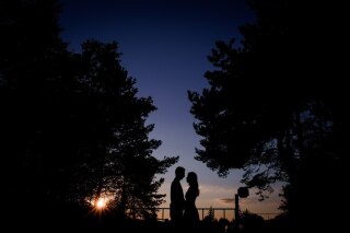 silhouettes-couple-standing-evening-lights_8353-1692.jpg